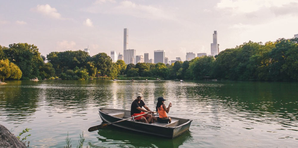 Couple rowing in Central Park in New York City