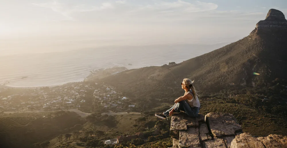 Girl looking out over Cape Town from Table Mountain